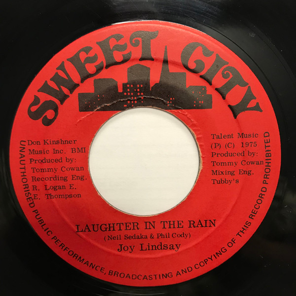 Laughter In The Rain / Saucy Sue