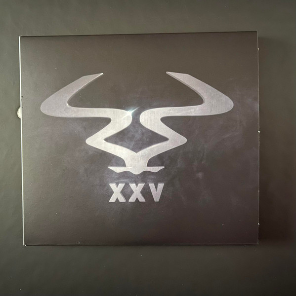 XXV