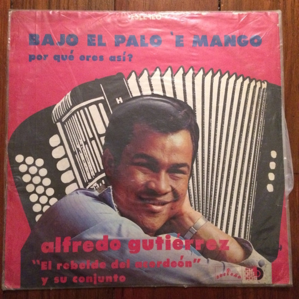 Bajo El Palo E' Mango