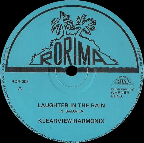 Laughter In The Rain / What A Watt