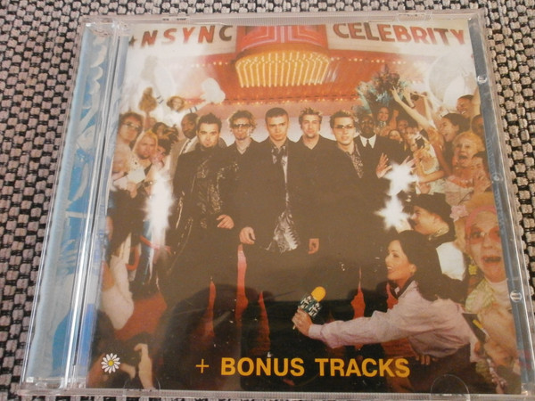 Celebrity  + Bonus Tracks